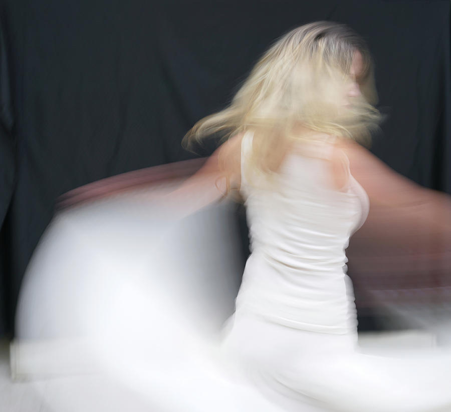A Dance in White #1242 Photograph by Raymond Magnani