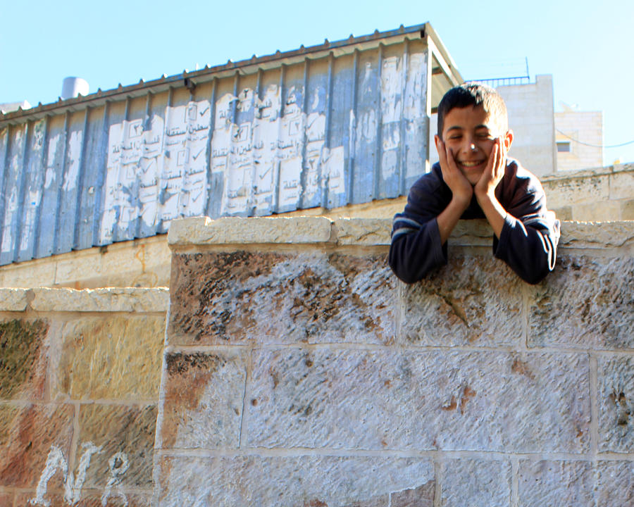 Portrait Photograph - A kid from Batir - Bethlehems village by Munir Alawi