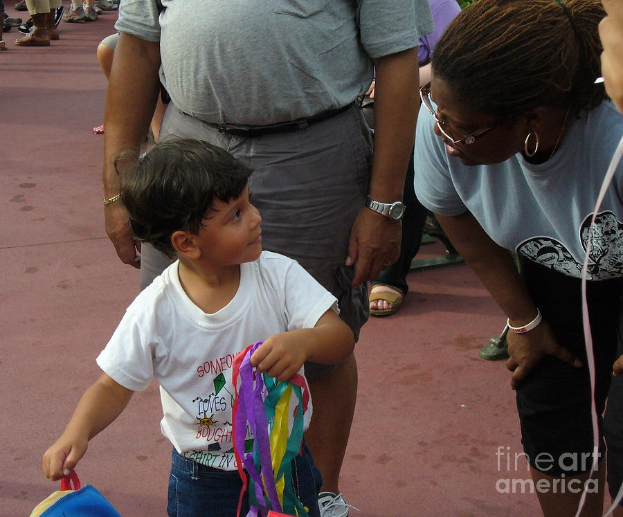 A Kid Playing at The Move It Shake IT Celebrate Street Party at Disney World Photograph by Lingfai Leung
