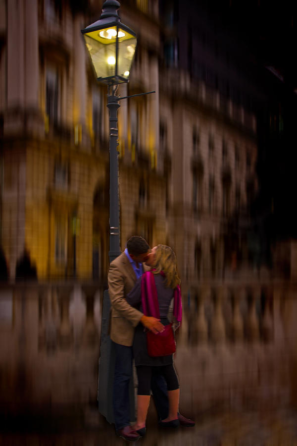 A Kiss Under the Lamp light Photograph by David French