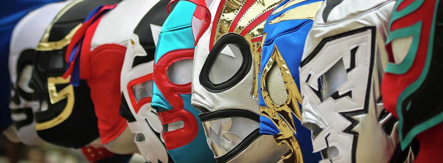 Sports Photograph - A Line of Lucha Libre Luchador Masks by Derrick Neill
