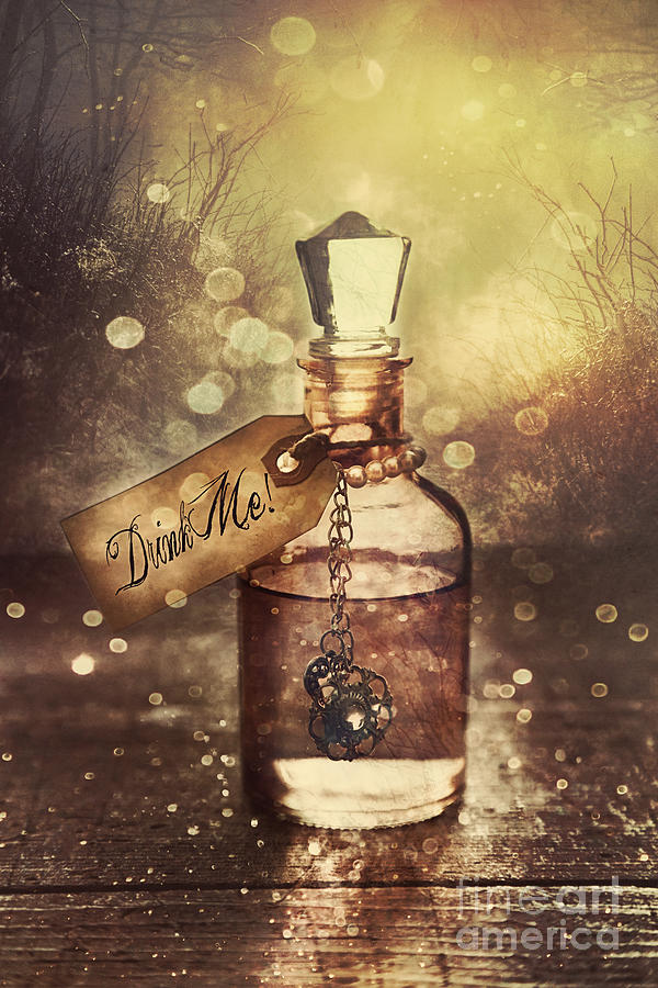 A little bottle with a potion that says Drink Me Photograph by Sandra Cunningham