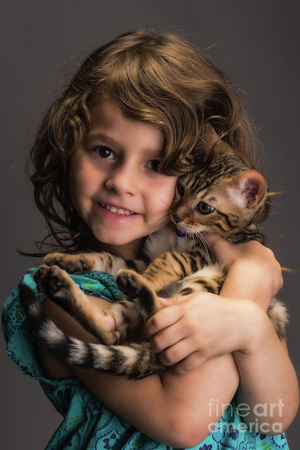 A Little Girl And Her Kitten Photograph