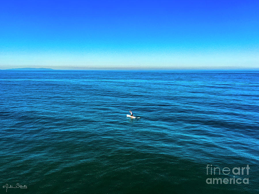 A Lone Sailor In The Ocean Photograph