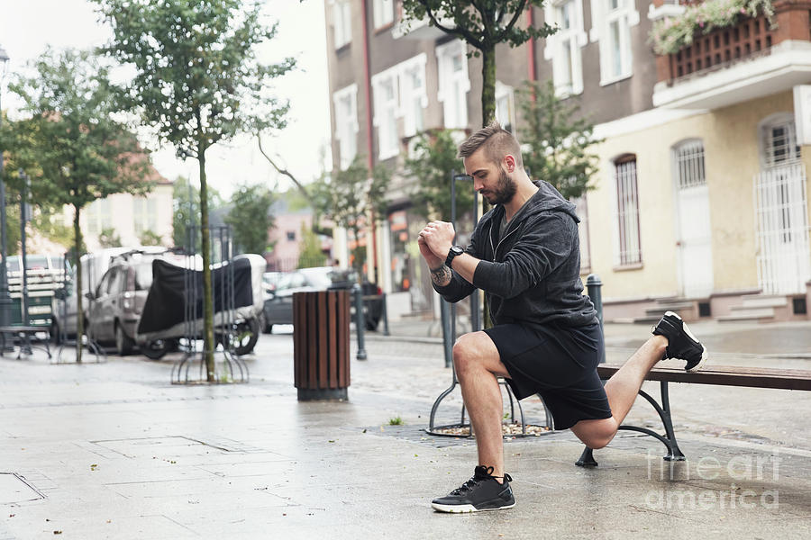 A man working out on a street Photograph by Michal Bednarek