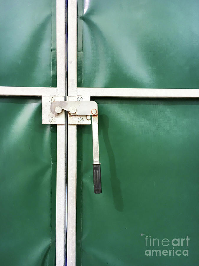 A metal lock Photograph by Tom Gowanlock