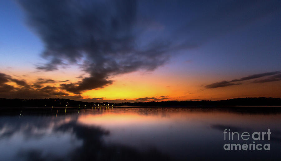 A misty sunset on Lake Lanier Photograph by Bernd Laeschke