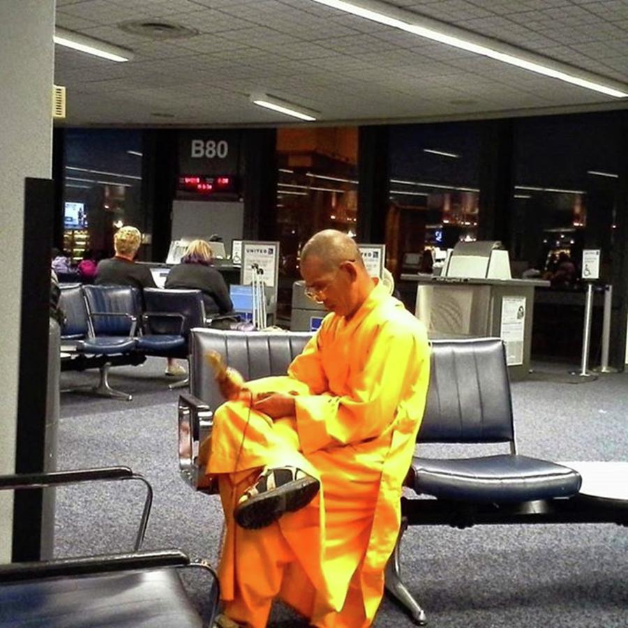 Houston Photograph - A Monk Using His Cellphone At The by Cheray Dillon
