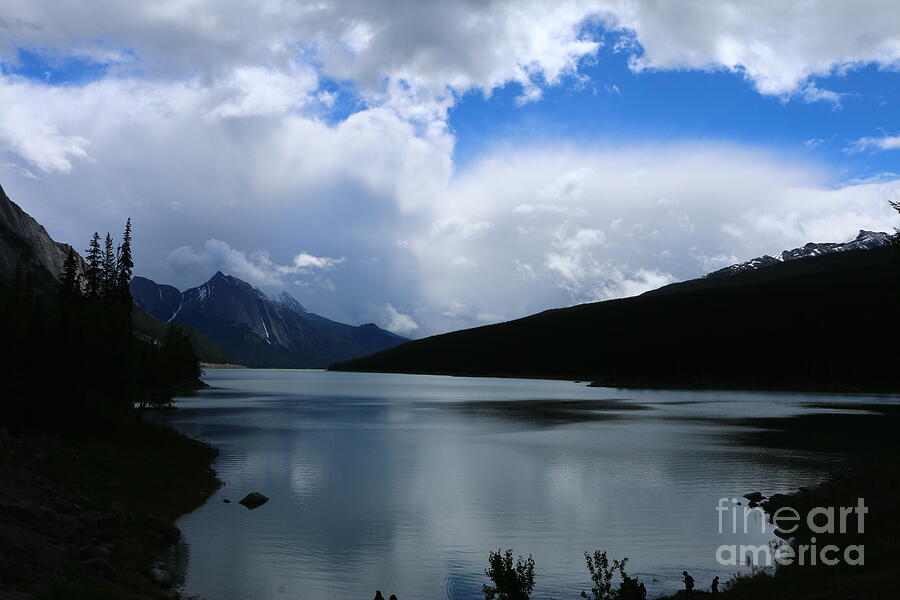 A Moody Sky Over Medicine Lake Photograph by Christiane Schulze Art And Photography