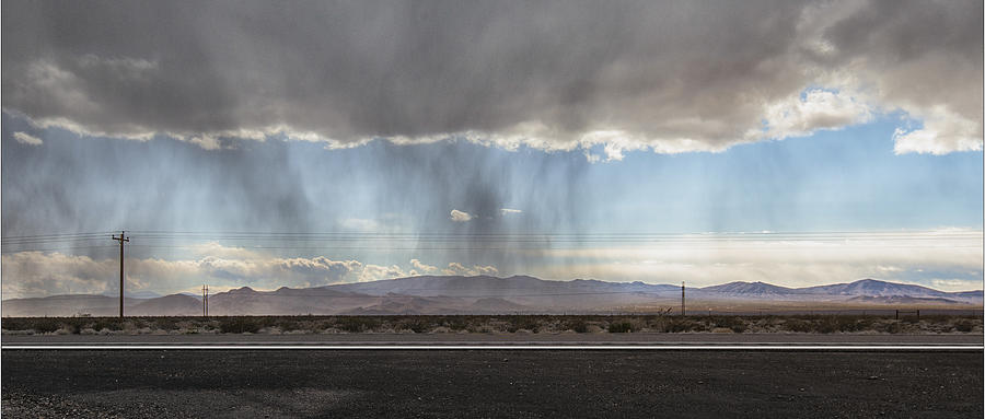 A moving storm on Nevada Route 95 Photograph by Gary Warnimont
