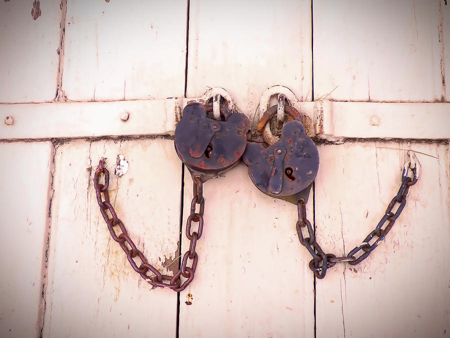 A Pair Of Old Padlocks Photograph by Leslie Montgomery
