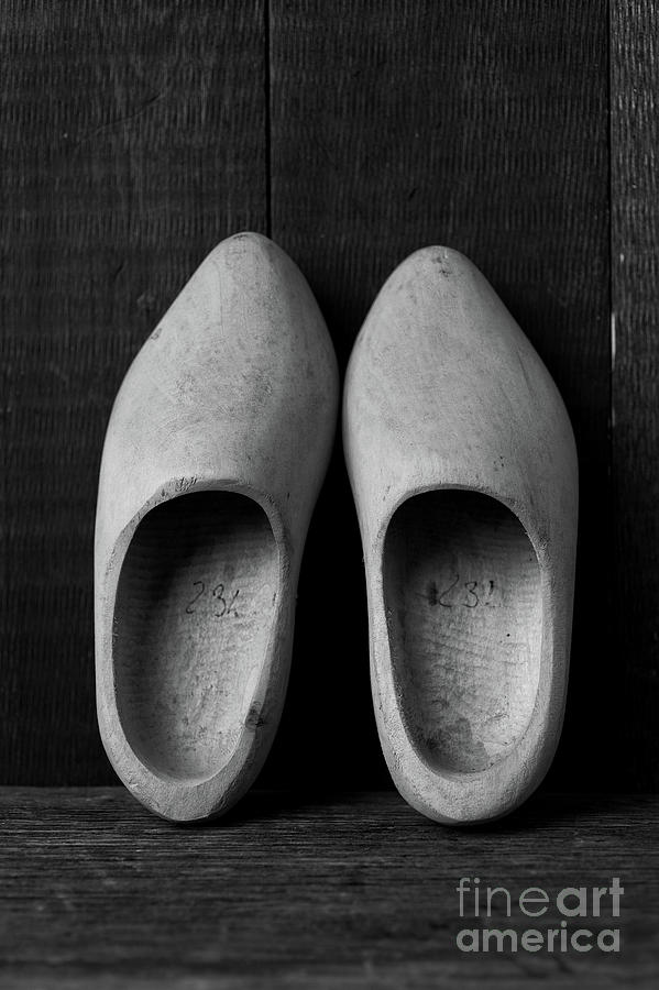 A pair of old wooden shoes Photograph by Edward Fielding