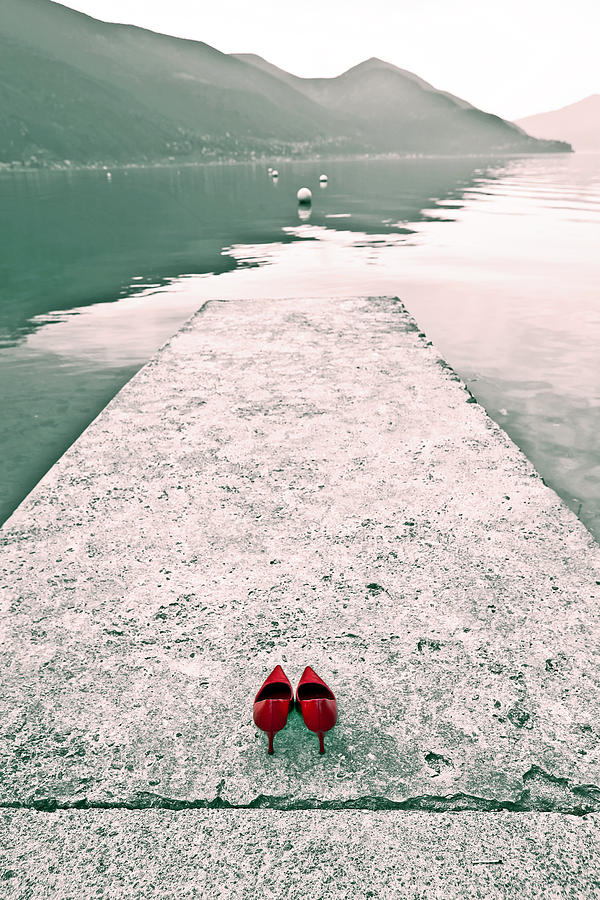 Mountain Photograph - A Pair Of Red Womens Shoes Lying On A Walkway That Leads Into A by Joana Kruse