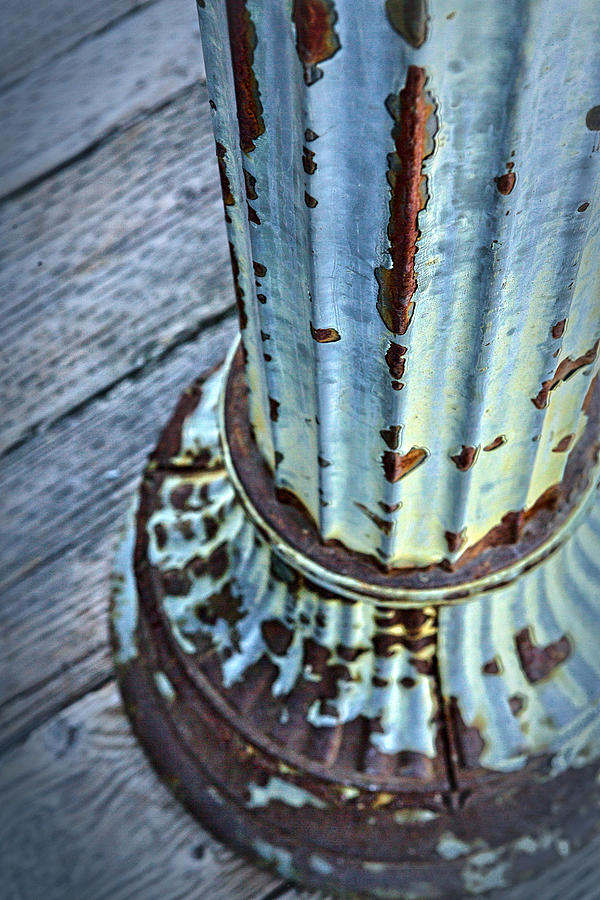 A Peeling Post In Blue Photograph