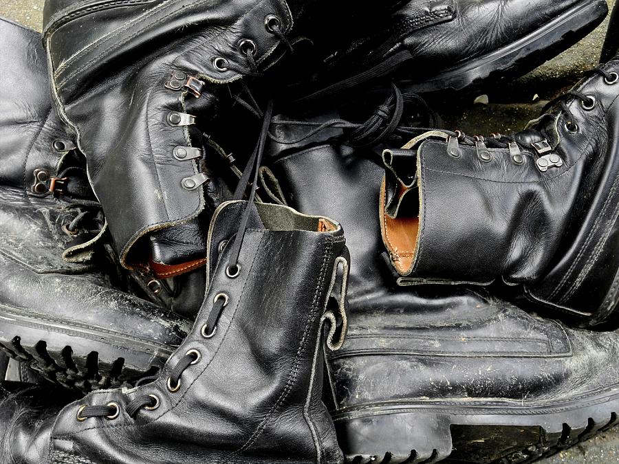 A pile of old boots. Photograph by David Cole