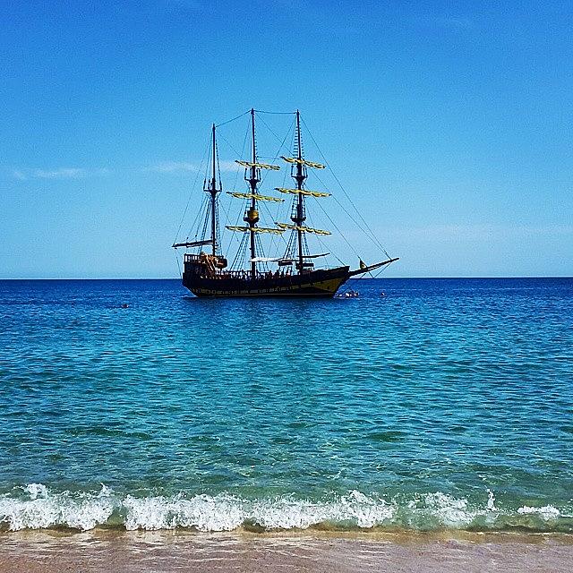 Nature Photograph - A Pretty Pirate Yacht Unloading Happy by Tanya Gordeeva