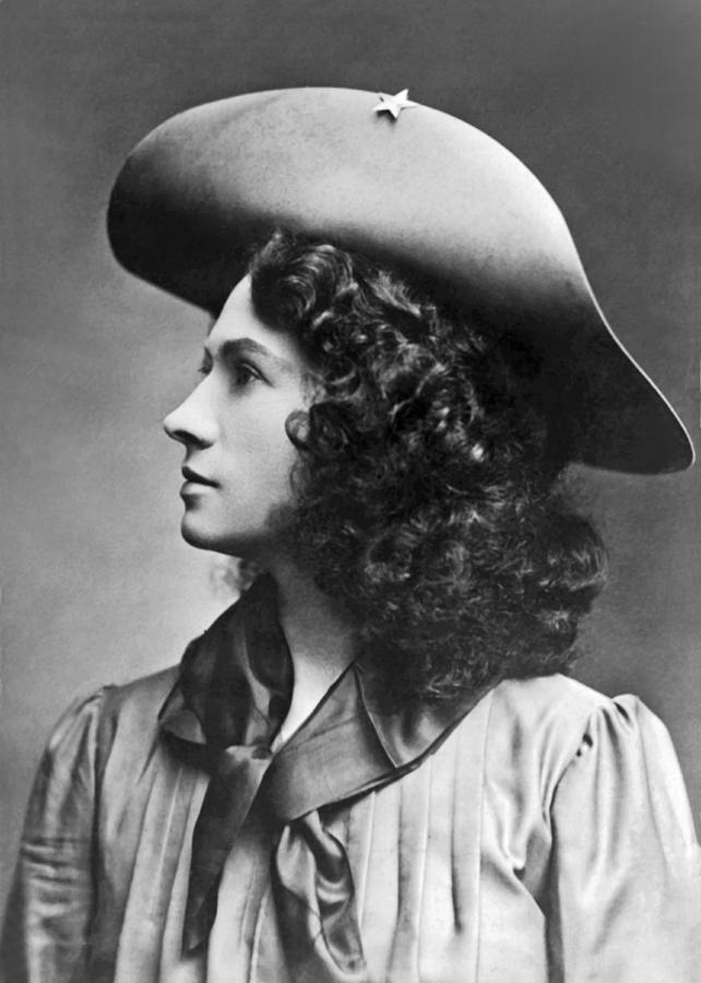 Black And White Photograph - A profile portrait of sharpshooter Annie Oakley by American School