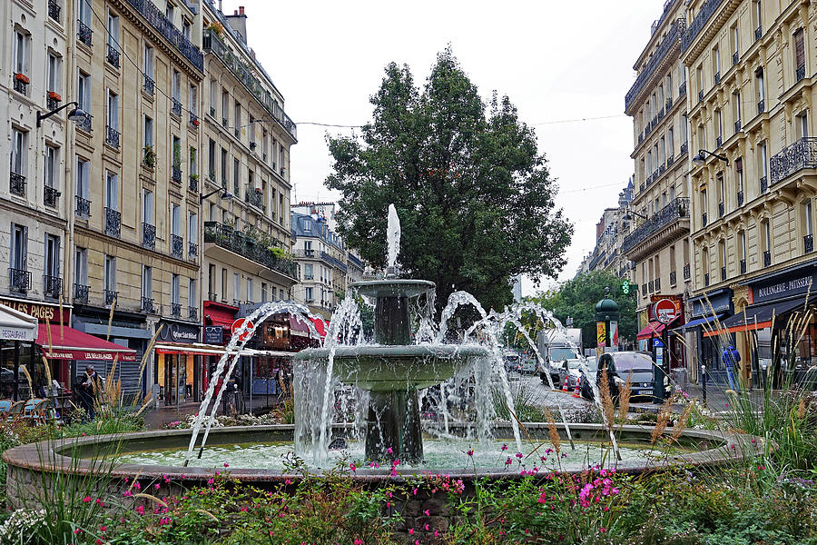 A Public Fountain In Paris, France Photograph by Rick Rosenshein
