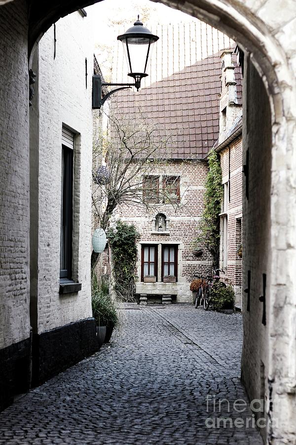 A quaint alley in the beguinage Photograph by Heidi De Leeuw