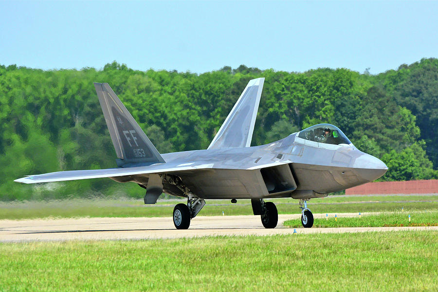 A Raptor Taxiing Back to the Ramp Photograph by Don Mercer
