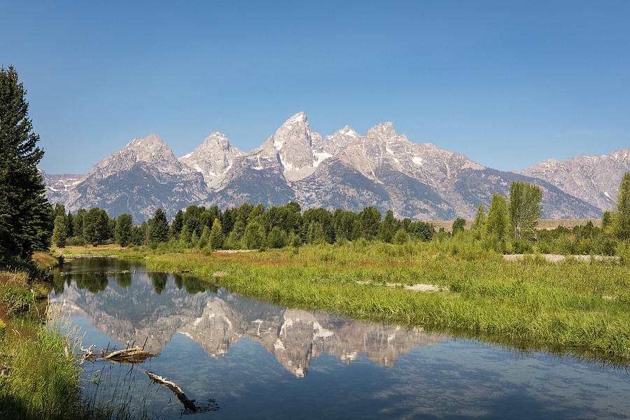 A Reflection Of The Tetons Photograph