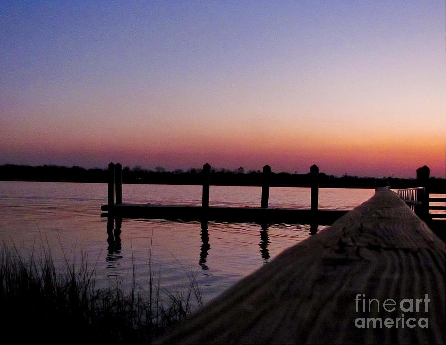 A River pier at Sunset Photograph by Johnnie Stanfield