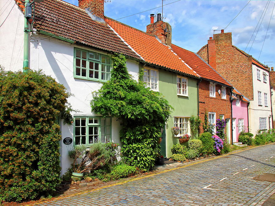 A Row of Cottages Photograph by Jeff Townsend