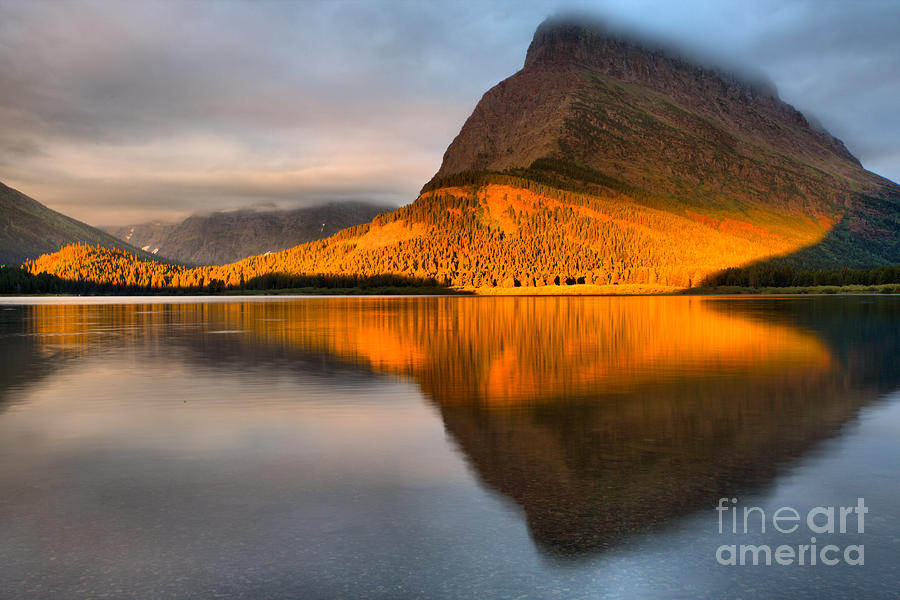 A Slice Of Orange Over Swiftcurrent Photograph by Adam Jewell