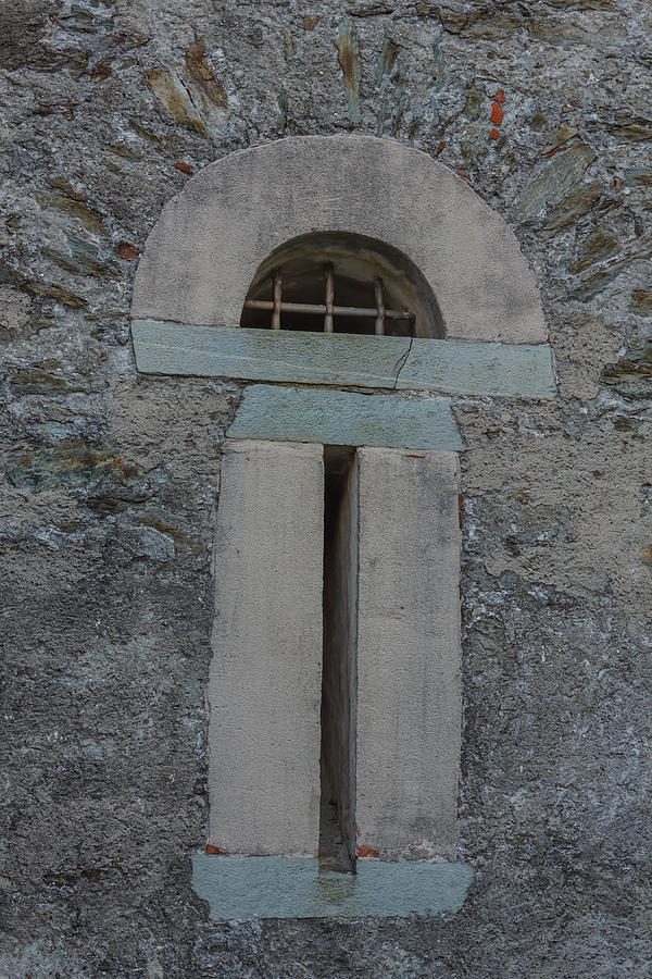 A Slit With Security Grating Of An Ancient Castle Photograph by Susanna ...