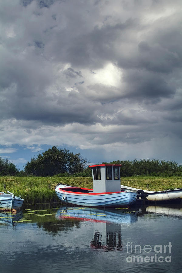 Boat Photograph - A storm moves on by Wedigo Ferchland