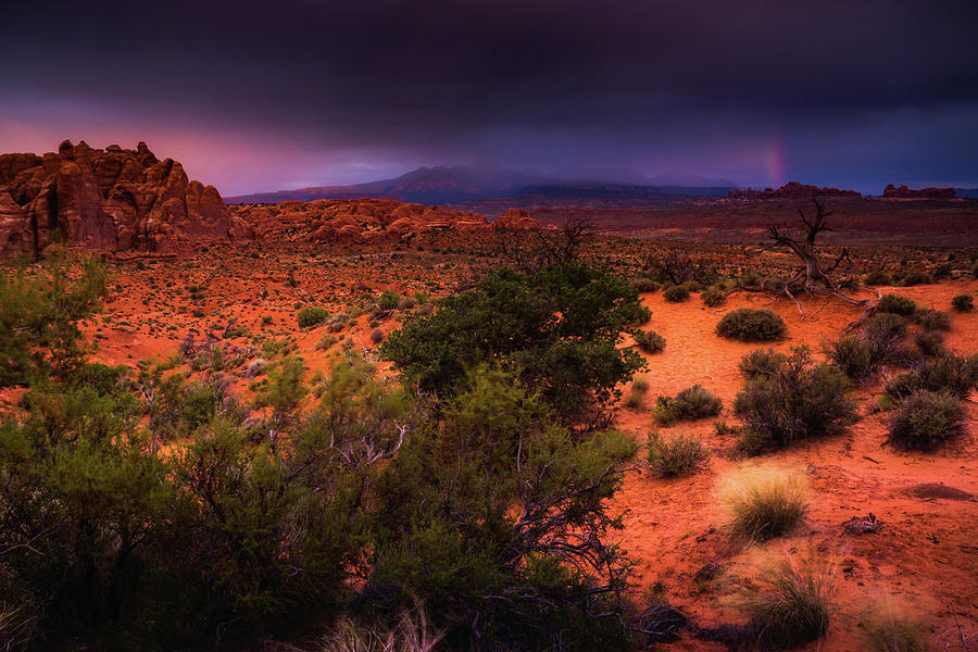 A Stormy Sunset At Arches  Photograph by John De Bord