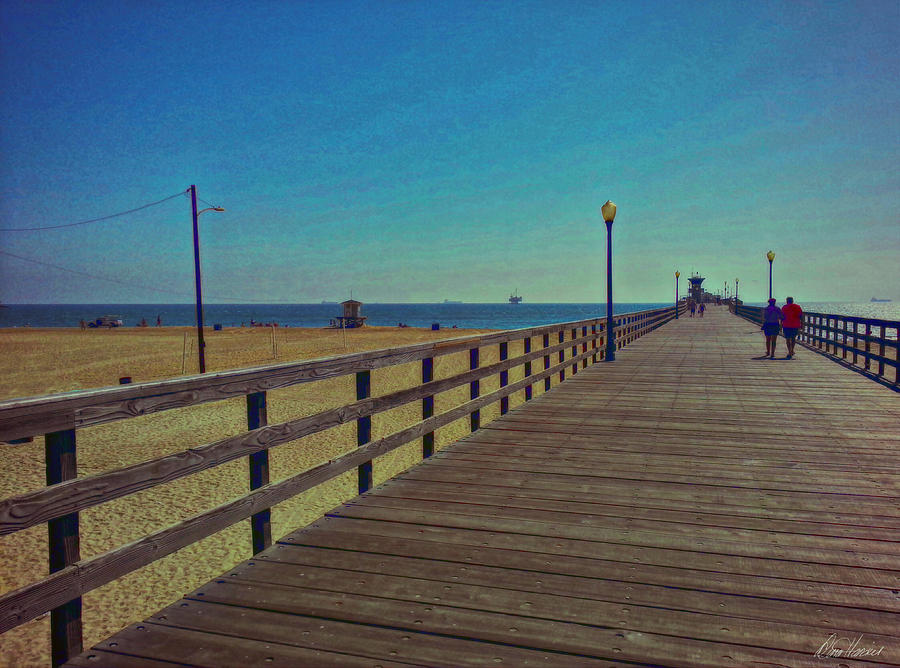A Stroll on the Pier Photograph by Diana Haronis