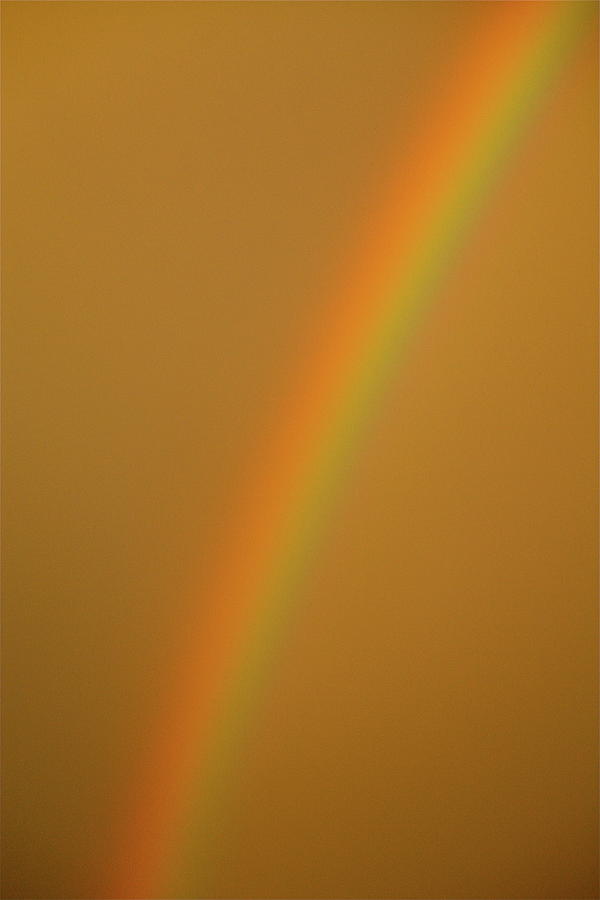 A Sunset Rainbow Photograph by Diana Hatcher