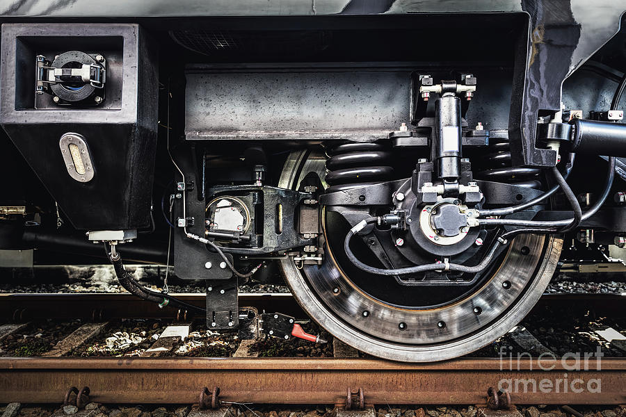 A train wheel close-up. Railway industry Photograph by Michal Bednarek