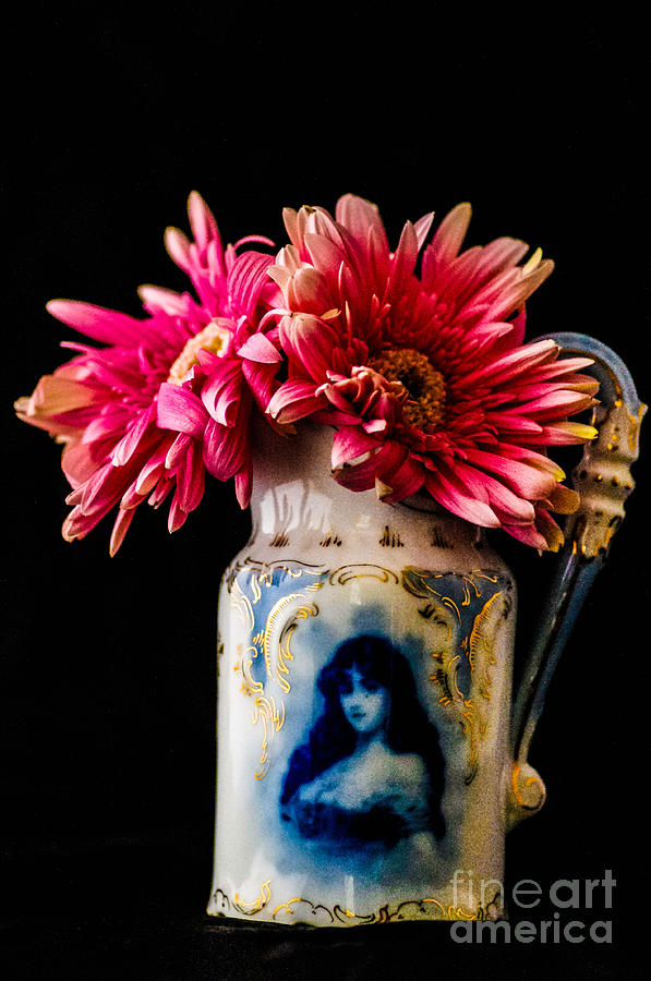 A unique vase with pink flowers  Photograph by Gerald Kloss