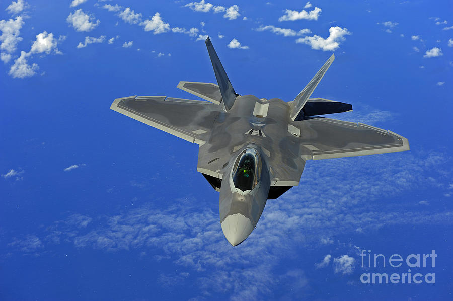 A U.s. Air Force F-22 Raptor In Flight Photograph by Stocktrek Images