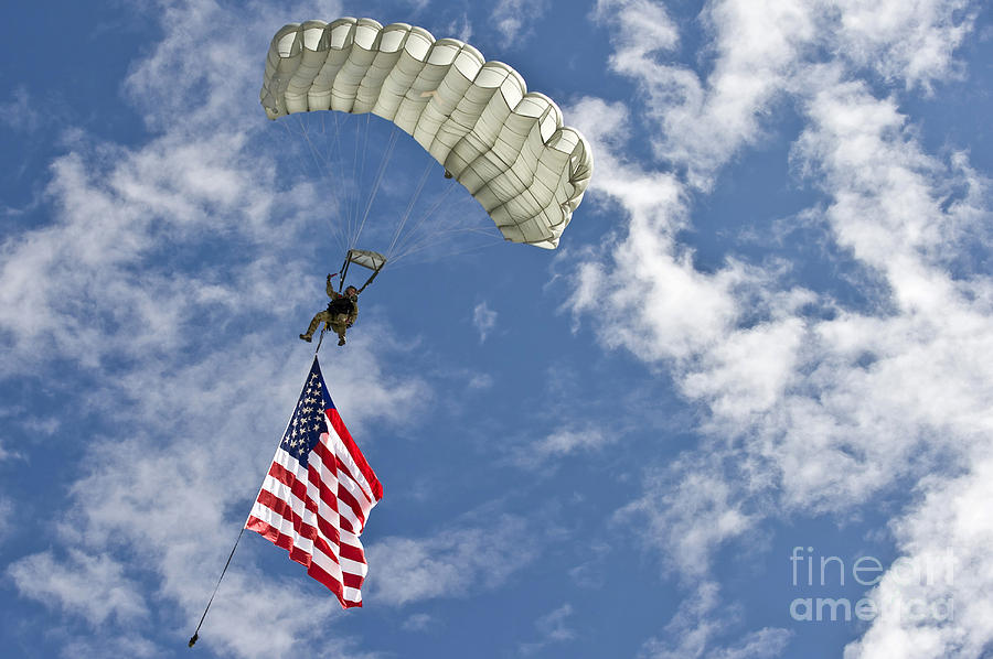 Flag Photograph - A U.s. Air Force Member Glides by Stocktrek Images