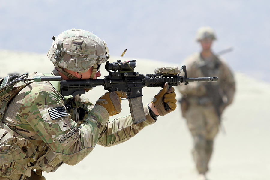 Transportation Painting - A U.S. Army Soldier, fires an M4 carbine rifle by Celestial Images