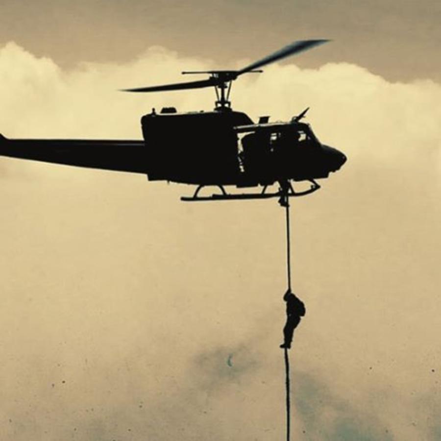 Helicopter Photograph - A #usmc #marine Conducts A Fast Rope by Alex Snay