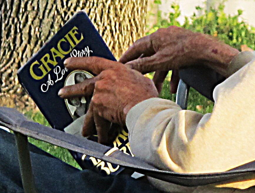 A Veteran Reads a Love Story Photograph by John King I I I