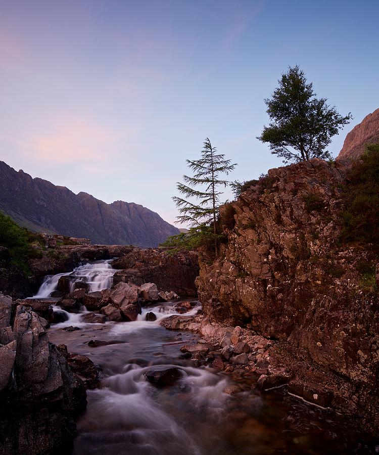 A vivid sunset on the River Coe Photograph by Stephen Taylor