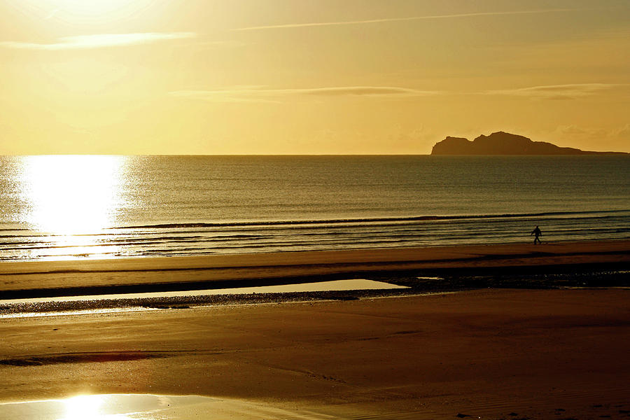 Beach Photograph - A walk along Portmarnock beach by Martina Fagan