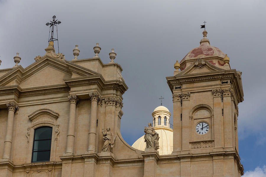 A Well Placed Ray of Sunshine - Noto Cathedral Saint Nicholas of Myra Against a Cloudy Sky Photograph by Georgia Mizuleva