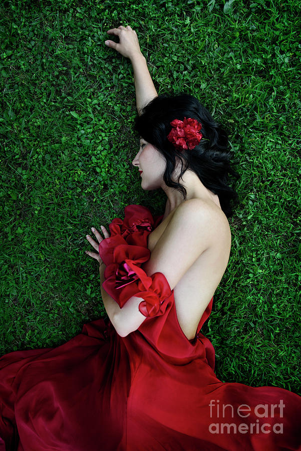 A woman sleeping on the grass in a red dress Photograph by Jelena Jovanovic
