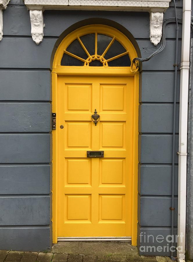 A yellow door in Ireland Photograph by Suzanne Lorenz