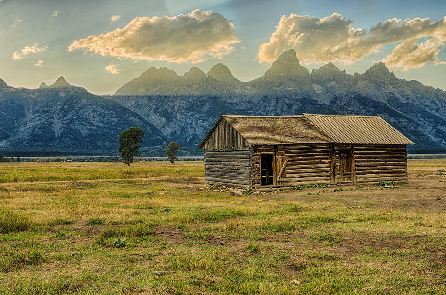 Abandoned cabin with Teton Mountains Photograph by John Trax