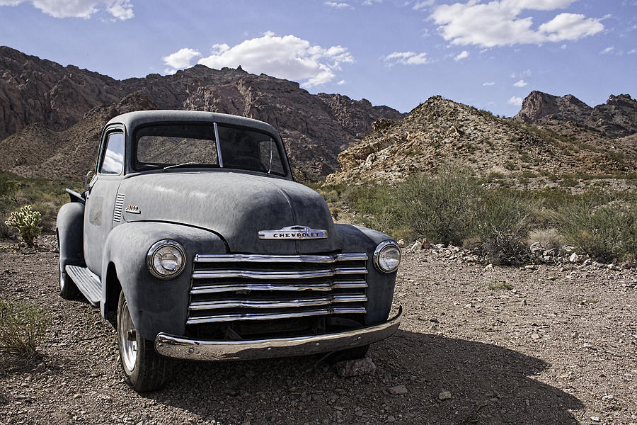 Abandoned Chevy in the Desert Photograph by Kristia Adams