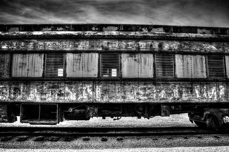 Black And White Photograph - Abandoned Circus Transport Car by Roger Passman
