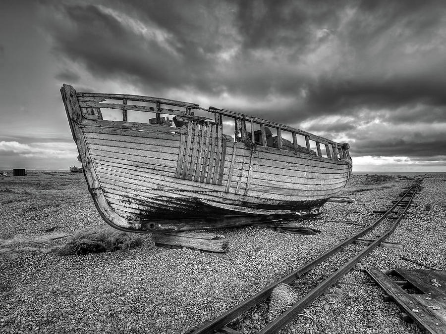Black And White Photograph - Abandoned Old Fishing Boat at Dungeness in Black and White by Gill Billington