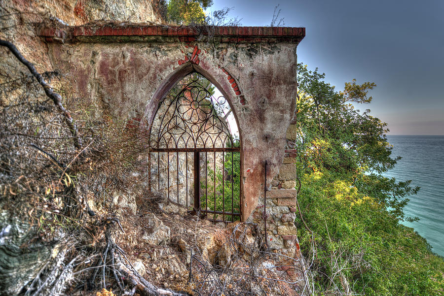 Abandoned Places IRON GATE OVER THE SEA - CANCELLATA SUL MARE CASTELLO BORELLI BORGHETTO S SPIRITO Photograph by Enrico Pelos